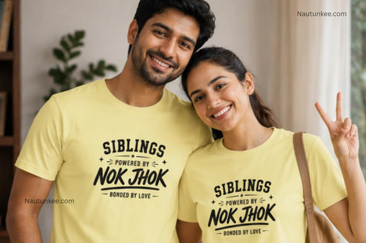 Brother and sister wearing matching sibling T-shirts with text that reads 'SIBLINGS POWERED BY NOK JHOK BONDED BY LOVE.