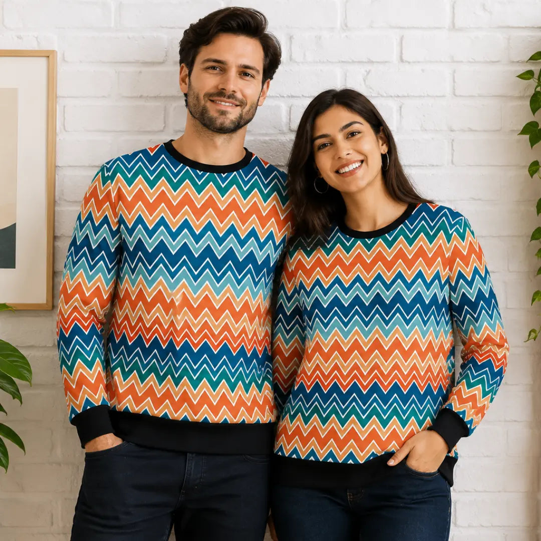 Couple wearing matching colorful sweatshirts for pre-wedding photoshoots by Nautunkee.