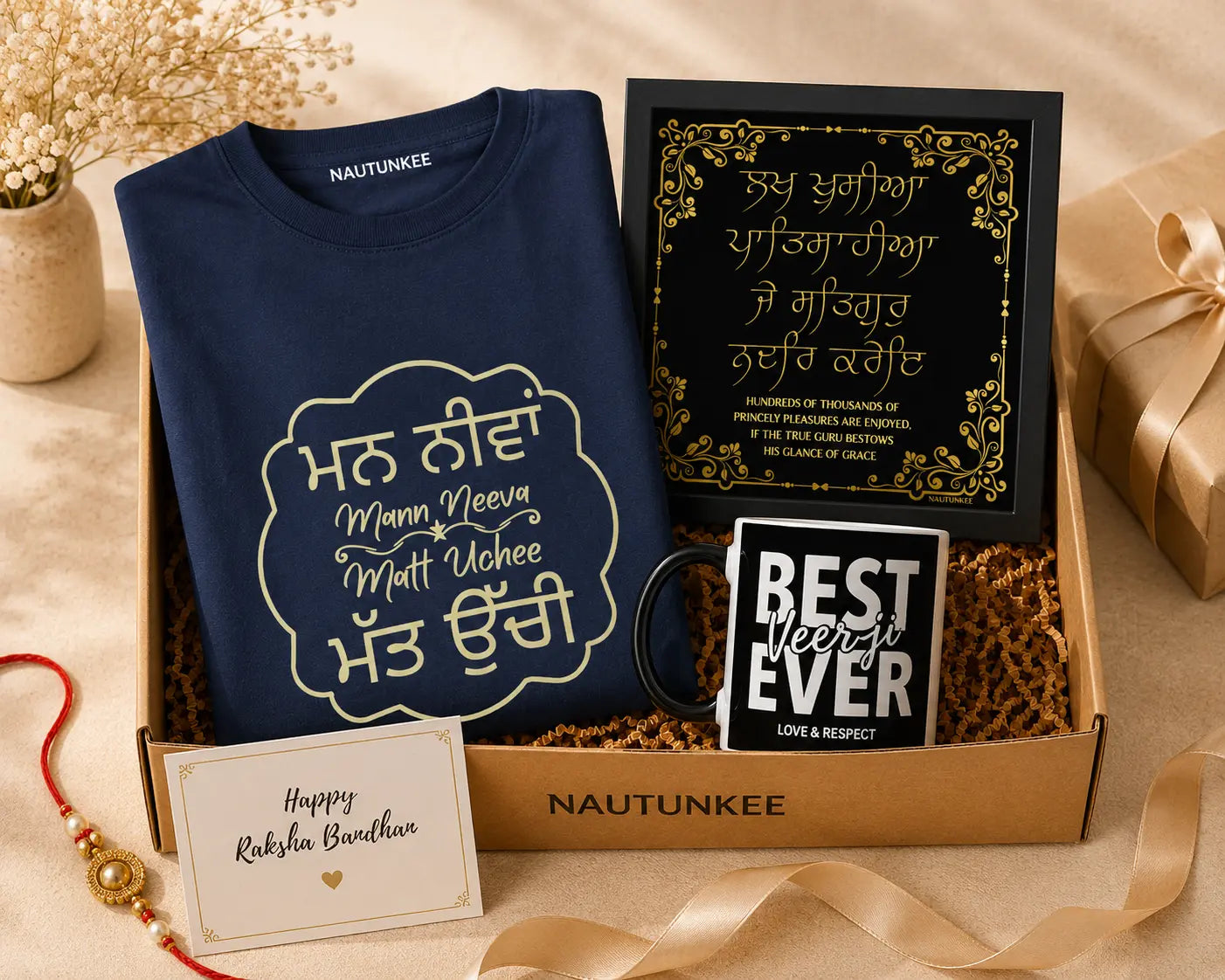 Premium Punjabi Rakhi gift hamper featuring a Mann Neeva Matt Uchee T-shirt, Best Veer Ji mug, and Sikh Gurbani framed poster.